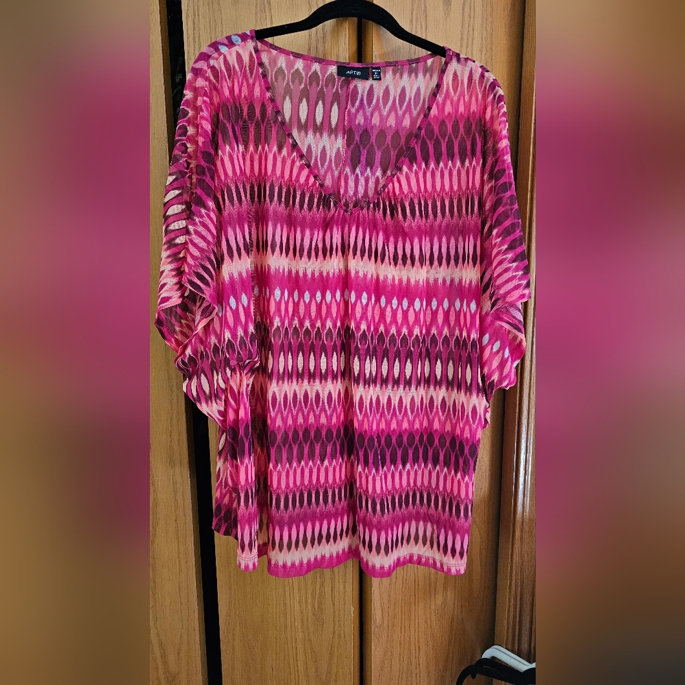 Plus size blouse for summer time wear.